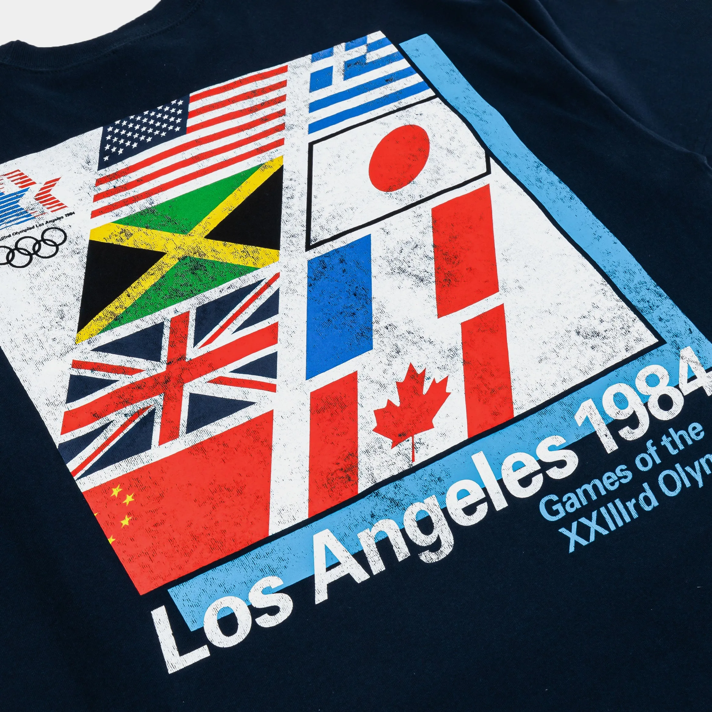 Sport Performance Design No-Shrink Fabric 1984 Los Angeles Emblem Flag Mens Short Sleeve Shirt (Navy/White)