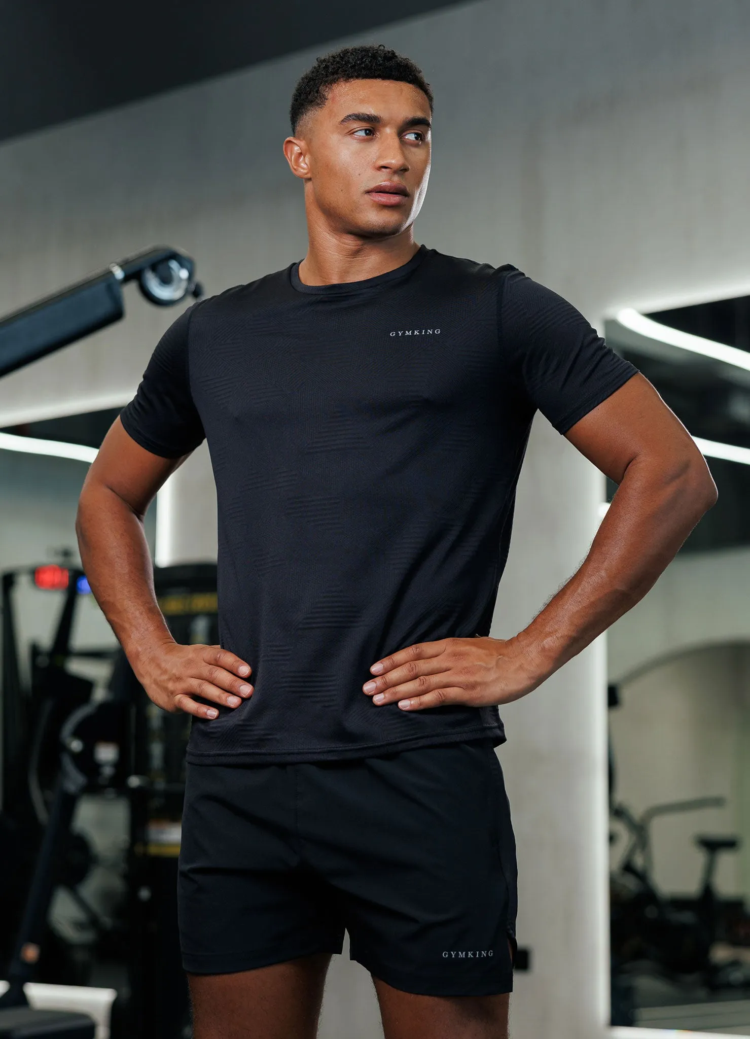 Layered Hem Detail EcoConscious Processing Gym King Geometric Knit Linear Tee - Black