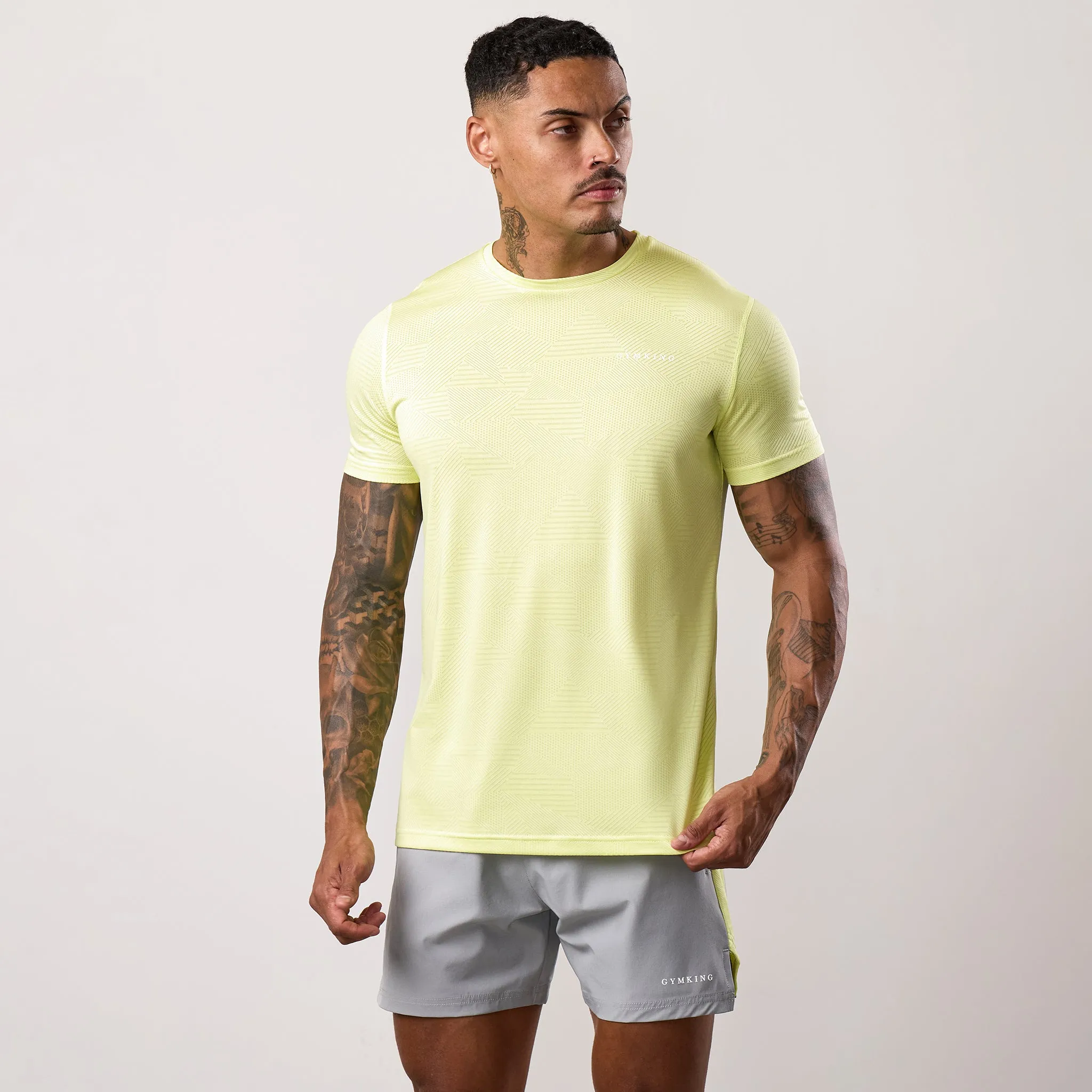 Gym King Geometric Knit Tee - Limelight LayeredHemDetails School spirit