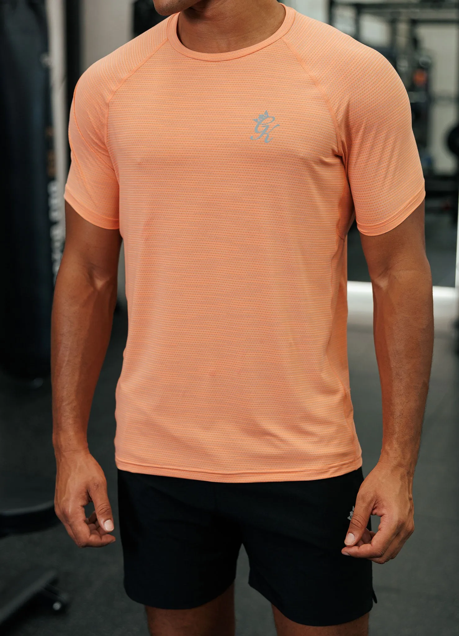 Soft touch finish Gym King Energy Grindle Tee - Sunset Coral