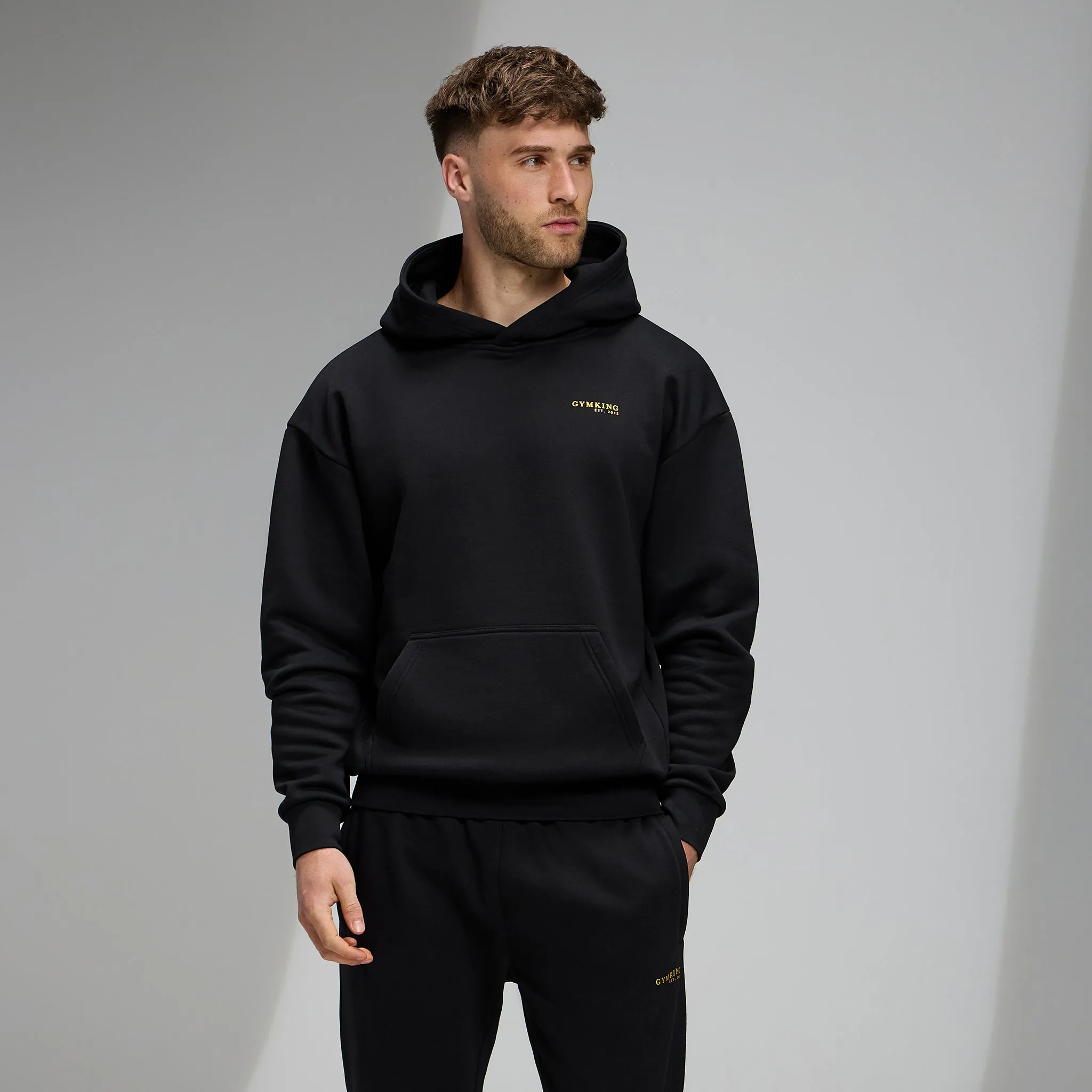 Gym King Established Relaxed Fit Hood - Black/Gold product team spirit product weekend wearability