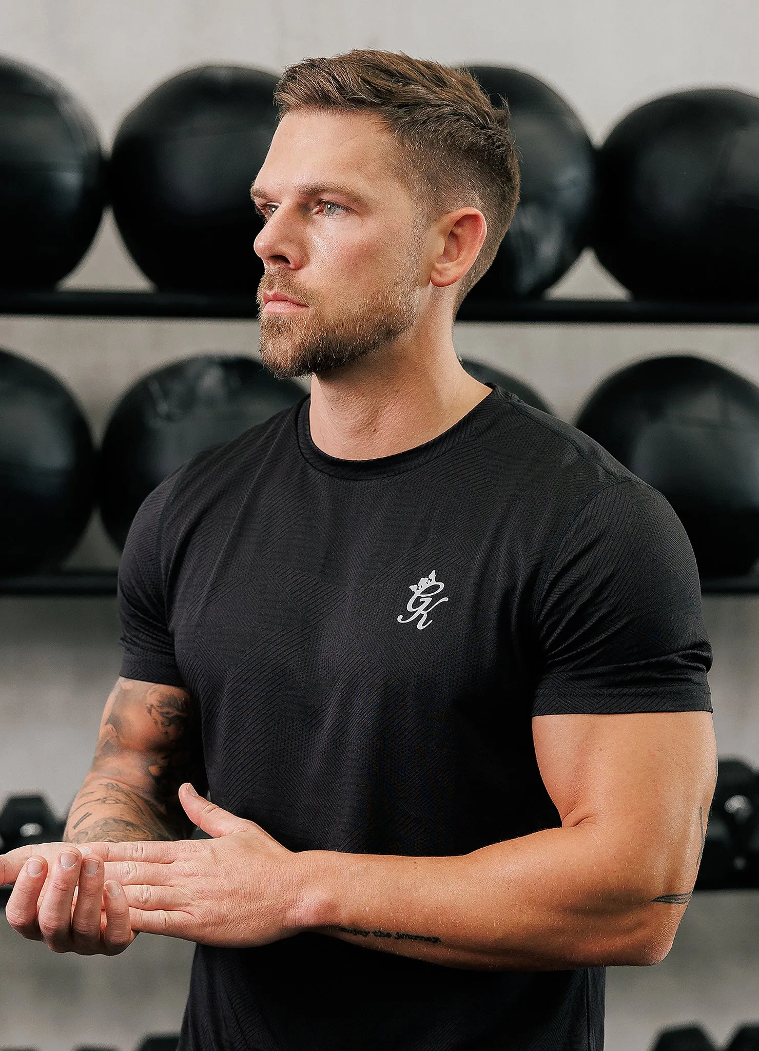 Gym King Geometric Knit Tee - Black Luxurious