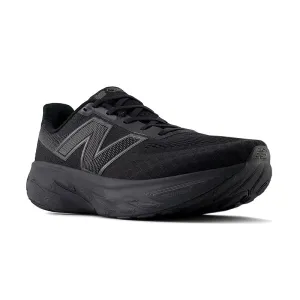 Men's 1080V14 All Black running in a dune area shoes