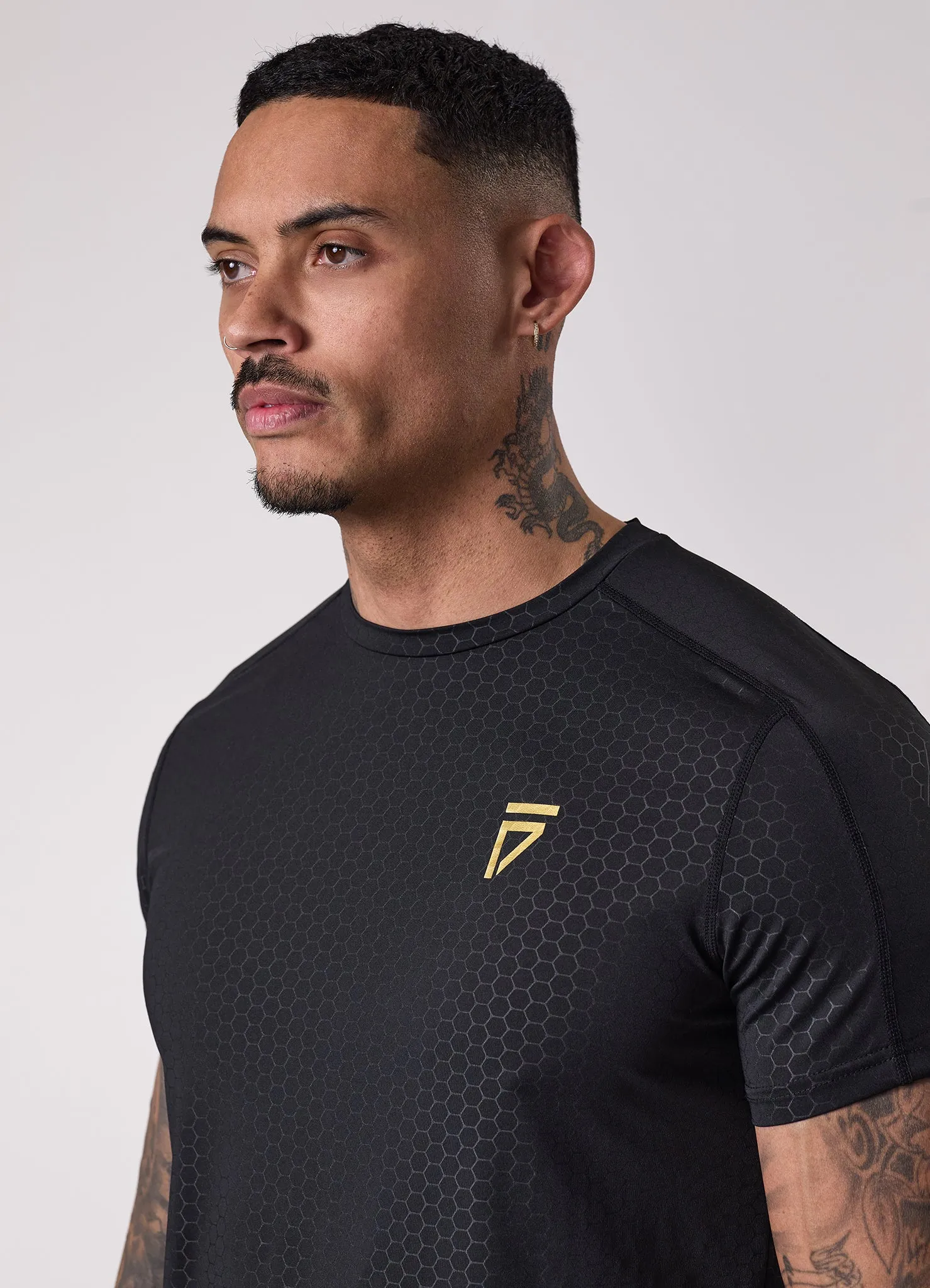 SeamlessConstruction Stylish and Comfortable Gym King Fight Division Debossed Training Tee - Black/Gold