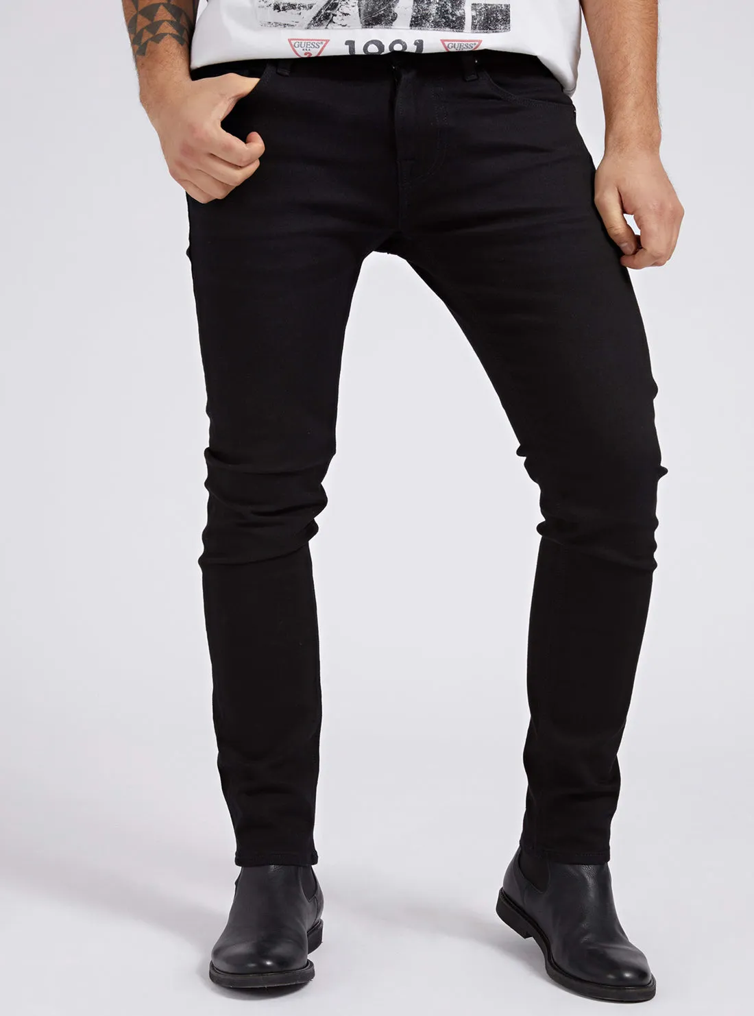 Chris Mid-Rise Super Skinny Denim Jeans in Black City Walk Smooth