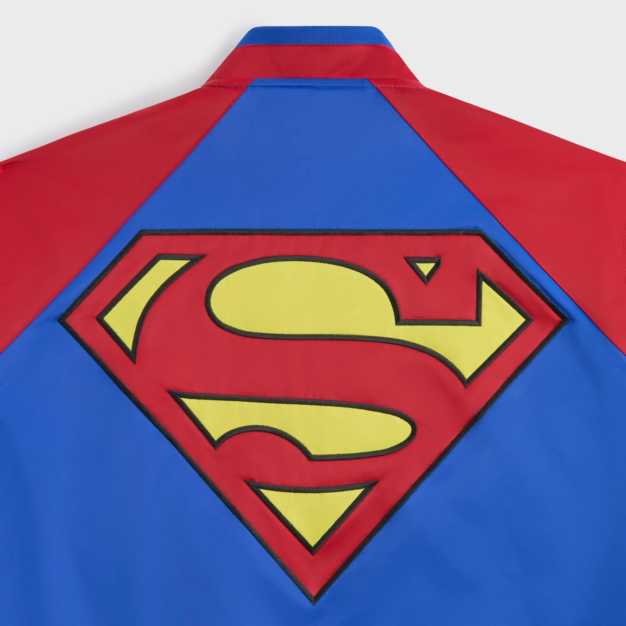 Superman | Kith Satin Bomber Jacket - Cyclone Articulated Elbows Layered Drape