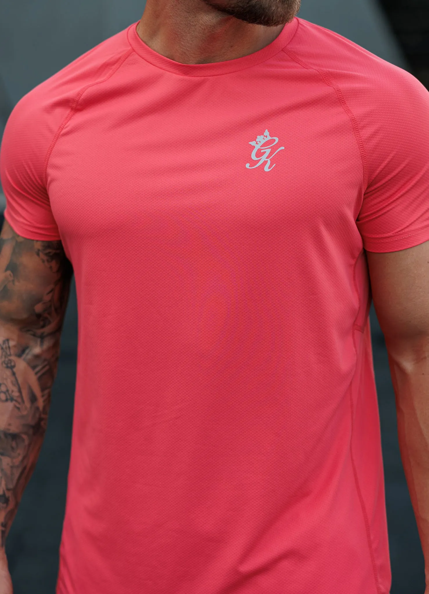 Gym King Energy Tee - Coral WrinkleResistant yoga clothing